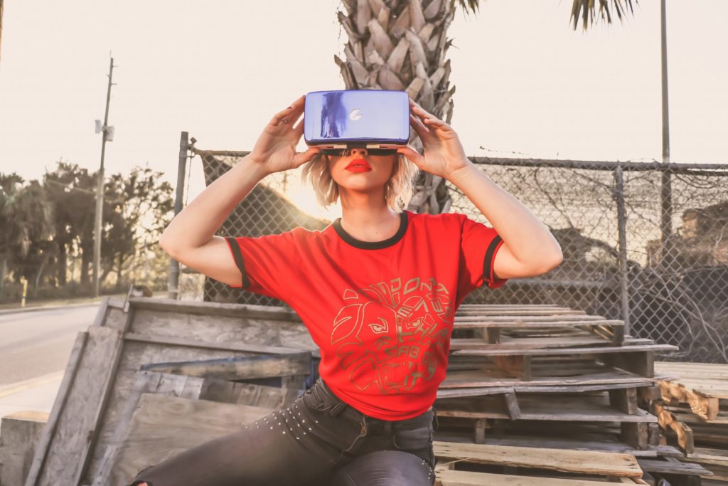 woman using VR goggles